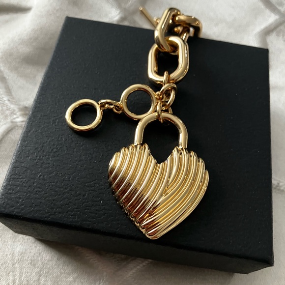 Gold Heart Charm Bracelet. Add a touch of flair to your basic look. - Picture 7 of 8